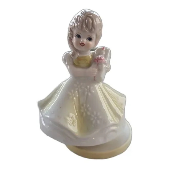 RARE Music Box Figurine With Lovely Young Girl Holding A Gift Plays Look Of Love