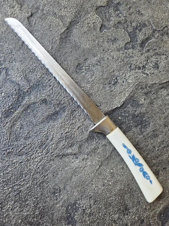 Cornflower Blue Lifetime Cutlery Serrated Table Knife with White Floral Handle