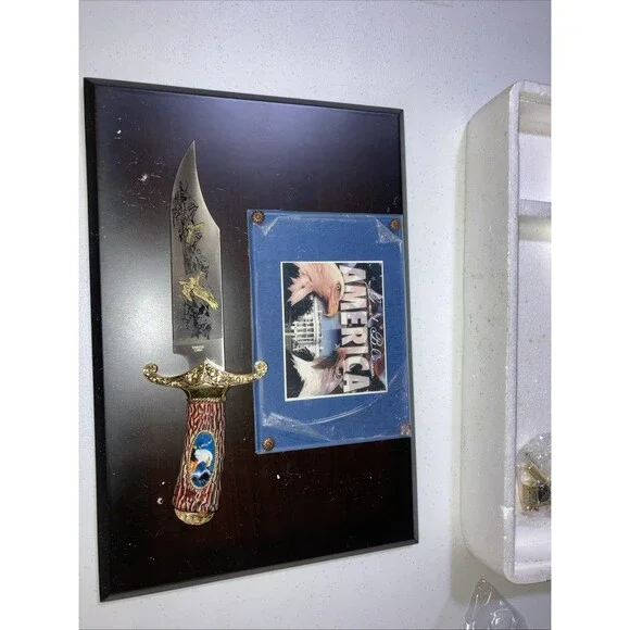 Bald eagle gold and silver with plaque hunting knife