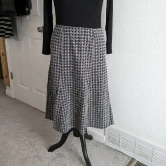 Beautiful Black and White Nine West skirt with embordered fabric