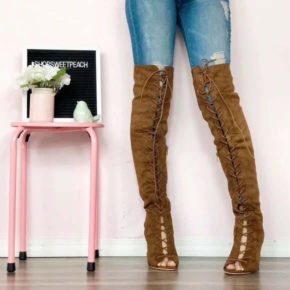 Over the knee lace up boots