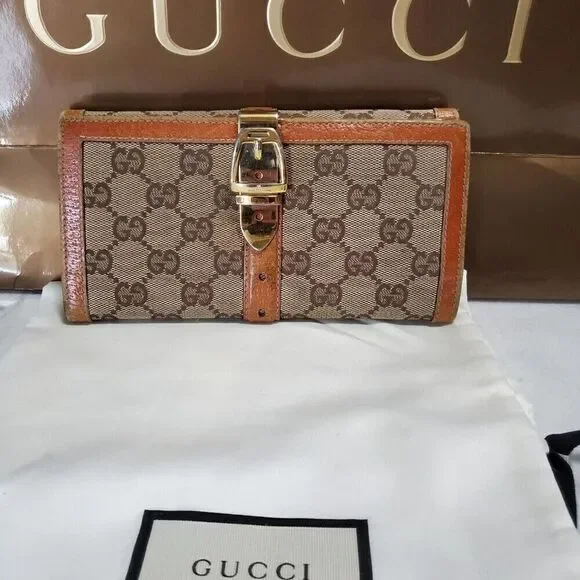 Gucci GG Logo Continental Canvas Tan Bifold Wallet with Leather Trim. 1462012778