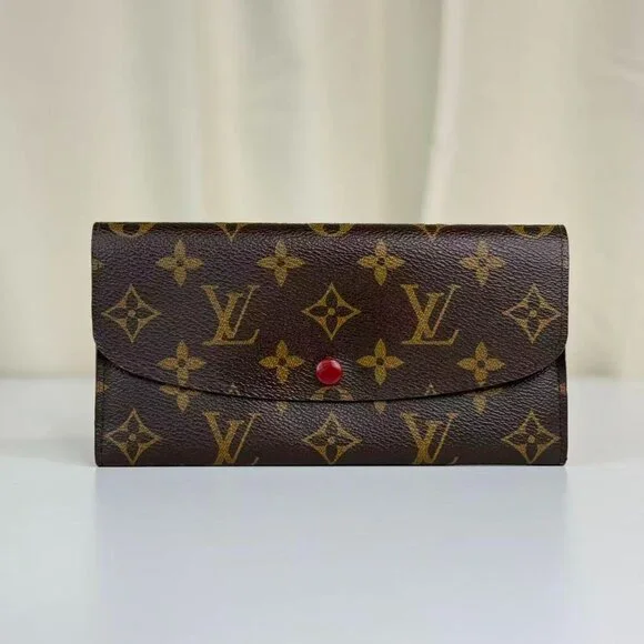 Louis Vuitton Monogram Canvas Wallet with Classic Design and Red Pin Detail