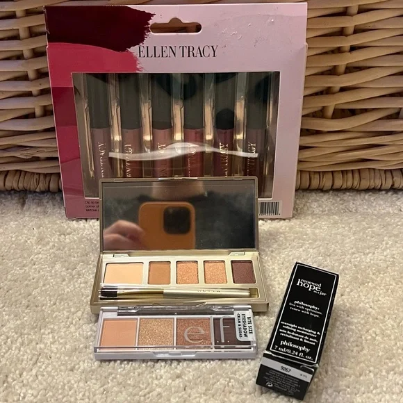 Assortment Of Makeup Products Lip Gloss Eye Shadow