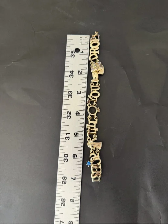 Gold Tone 'Shop Til You Drop' Charm Bracelet