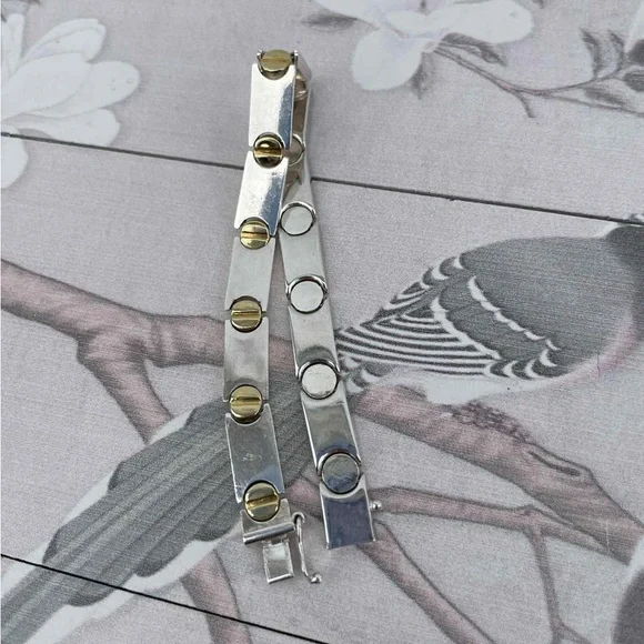 Elegant Silver and Gold Bracelet