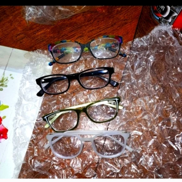4 pairs of prescription eyeglasses