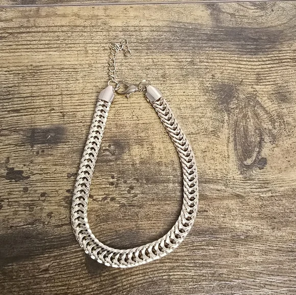 thick goldtone adjustable bracelet