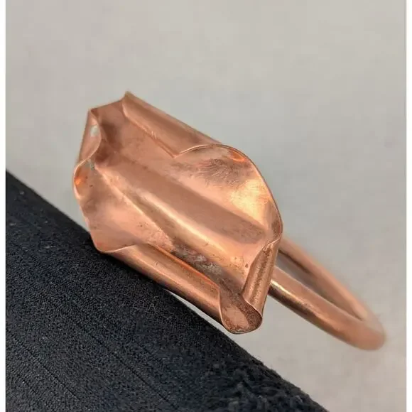 Copper bangle closed must fit over knuckles not more than ,7 .25'.Heavy gauge
