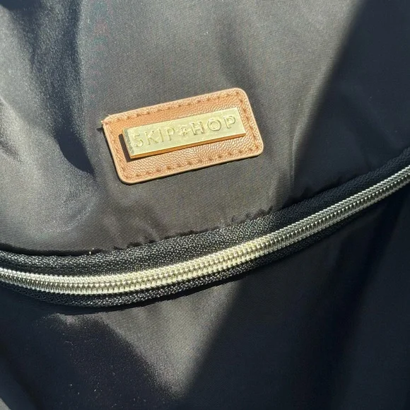 Skip Hop Black Backpack with Sleek Design and Durable Material