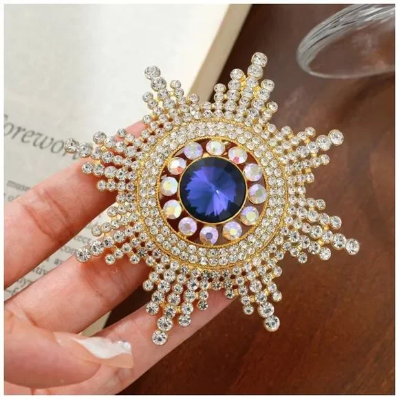 Regal Radiance Starburst Brooch Sapphire Blue Center Vintage Rhinestone Elegance