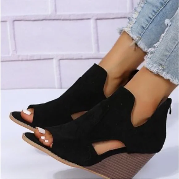 Black cut out suede wedge heels