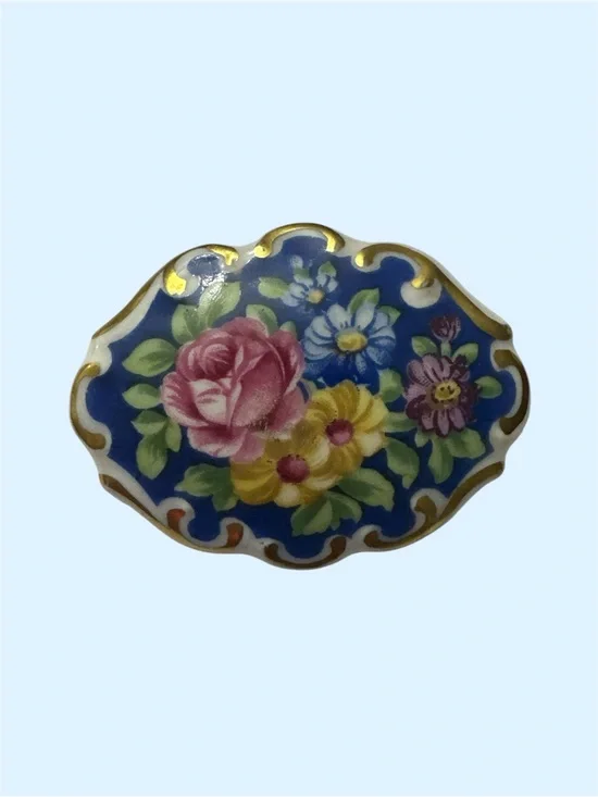Floral ceramic Brooch with Gold tone Accents - Blue Background