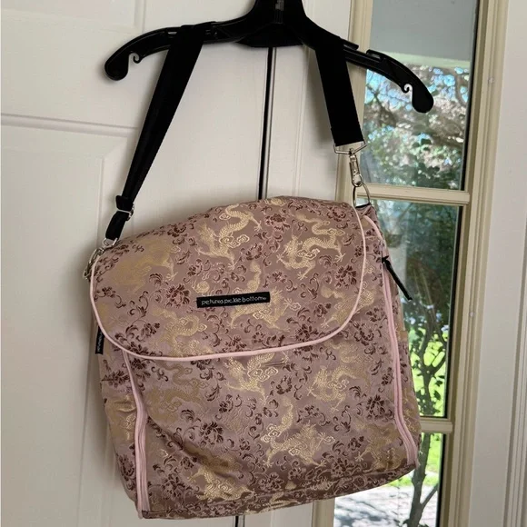 Petunia Pickle Bottom Pink and Gold Baby Bag sushi roll color