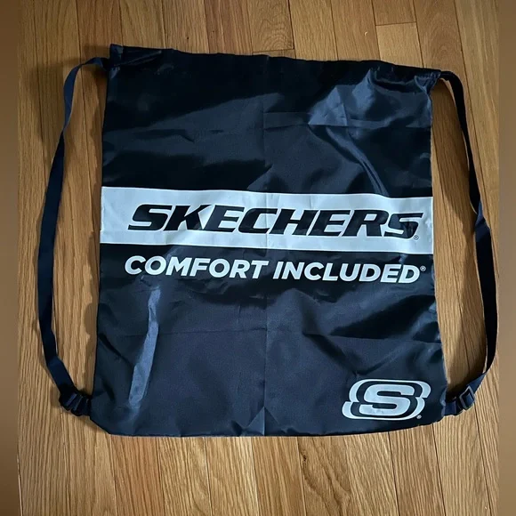 Sketchers navy nylon backpack with straps and hook that anyone can use.