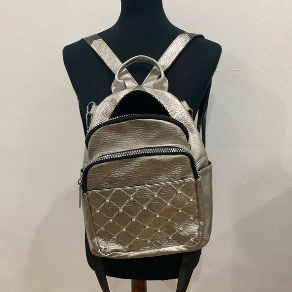 Silver Backpack 🎒 with a square sign and pearls