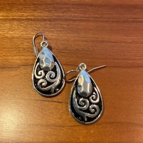 10 pairs of silver tone earrings