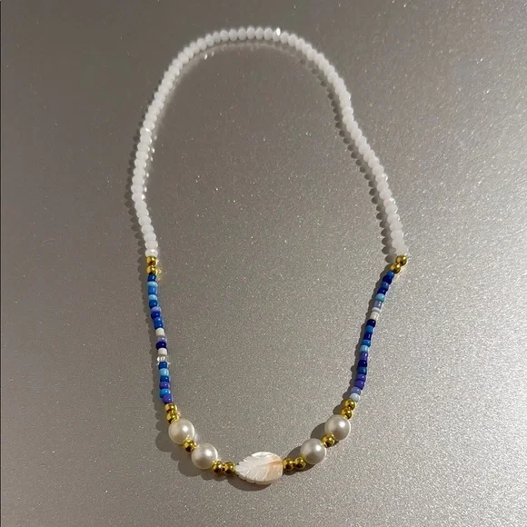 Chic Blue and White Beaded Necklace with Gold Accents