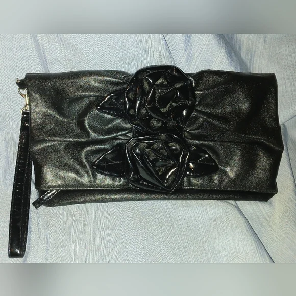 NOATD Elegant Black Clutch with Floral Design.