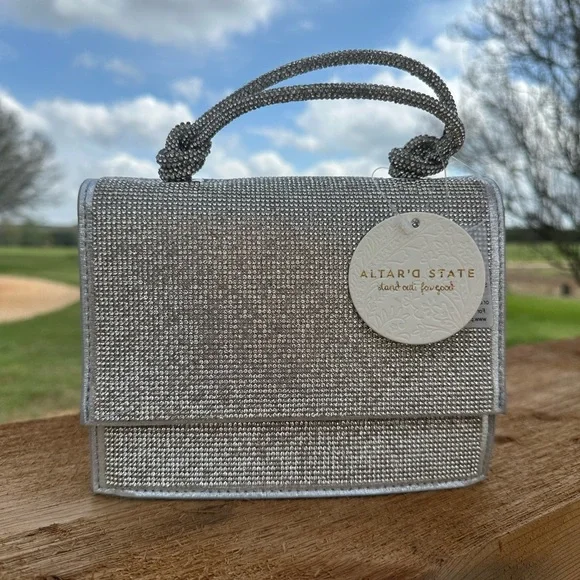 NWT Urban Expressions Silver Clutch/Purse with handle and matching chain straps.