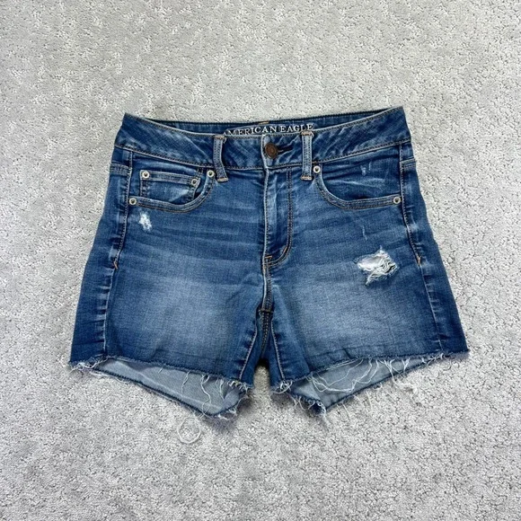 American Eagle Denim Shorts Size 4 Hi-Rise Shortie Blue Denim Distressed Stretch