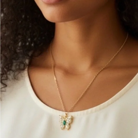 Elegant Gold Butterfly Pendant Necklace with green crystals NWT.