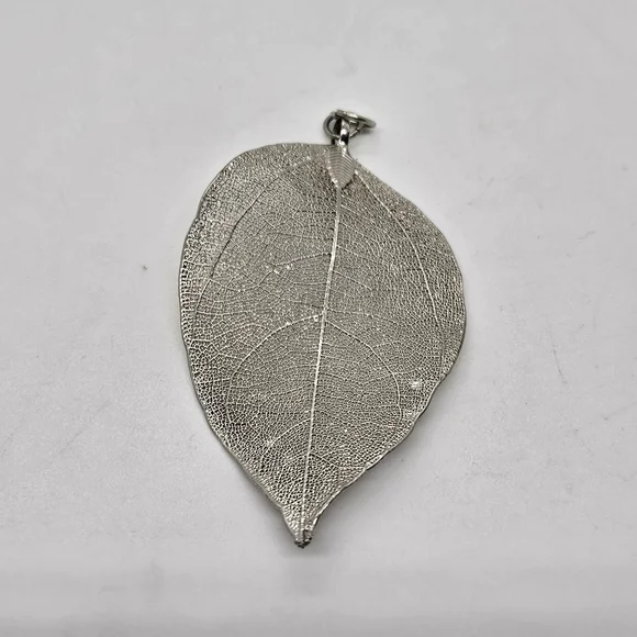 large silver tone leaf pendant