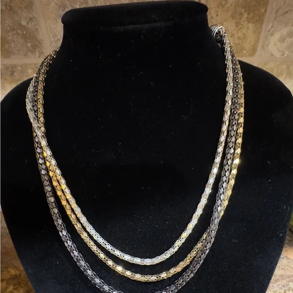 Necklace 3 Strand looks like Gold Silver Platinum. 16 to 20 in adjustabl…