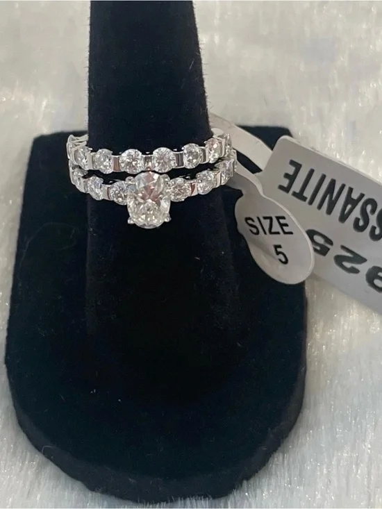 Woman’s size 5 2 piece rhodium plated over 925 silver 2.00ctw Moissanite ring