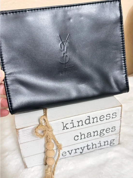 Yves Saint Laurent Black cosmetics bag with Embossed YSL