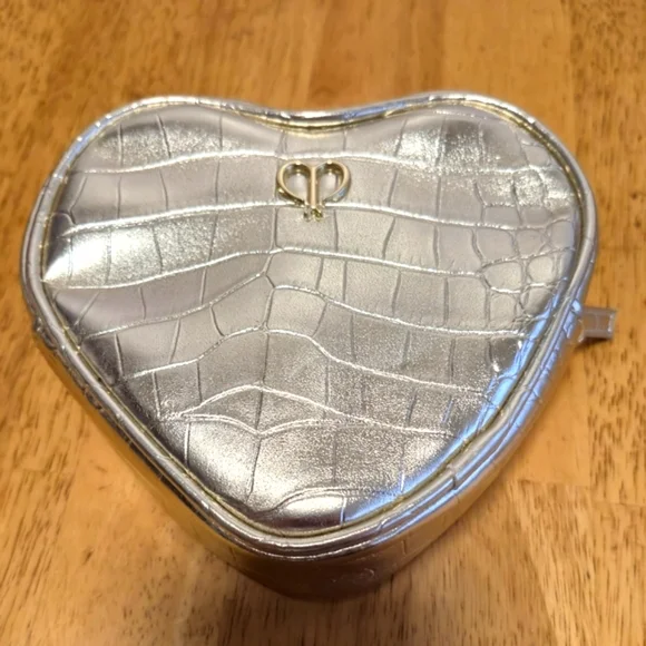 Cle de Peau golden Quilted Cosmetic Bag‎