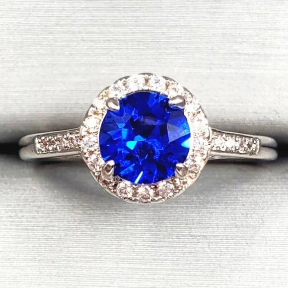 Blue Sapphire Simulant & Diamond Simulants Rhodium Plated Silver Tone Halo Ring