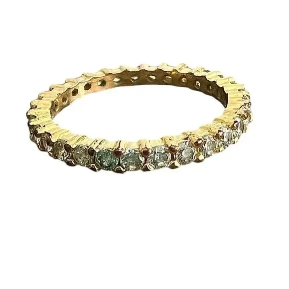 Gold tone rhinestone studded ring band - size ~6.5