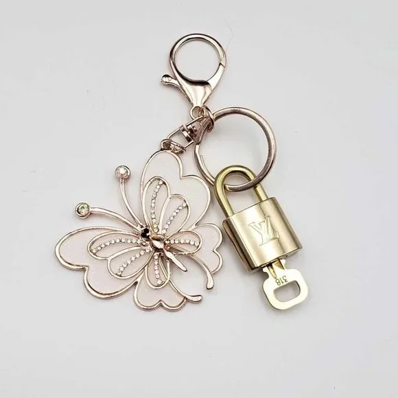 Authentic Louis Vuitton Lock & Key with unbranded Butterfly Bagcharm, Keycharm
