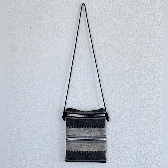 Like new black and white woven crossbody bag small