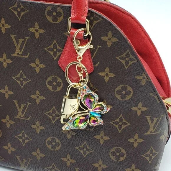 Authentic Louis Vuitton Gold Lock 🔒 Keychain Bag Unbranded Butterfly Charm LV