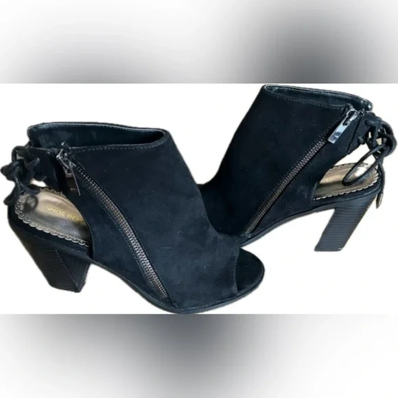 Black Peep Toe Booties with side zipper and chunky heel. NWOT. Women’s size 8.5