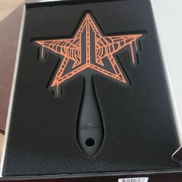 Jeffree Star Black Mirror with Orange Star Design