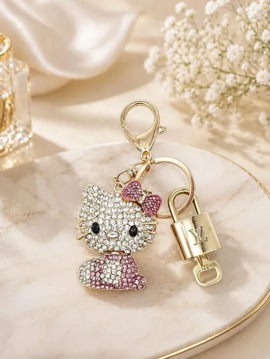 LV Authentic Gold Lock & Key 🔑Luxury Bag Charm w/Unbranded Hello Kitty Keychain