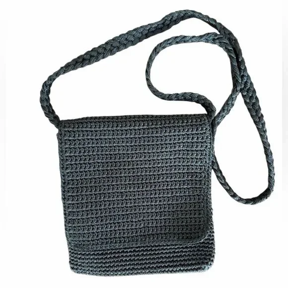 The Sak black crochet knit crossbody bag.