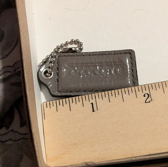 Coach Grey Patent Leather Hang Tag With‎ Silver Chain