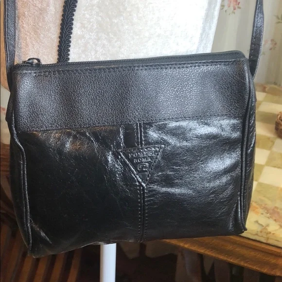 Black faux leather crossbody handbag