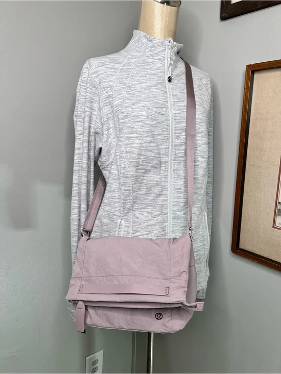 Lululemon On My Level Crossbody Bag in a light purple shade