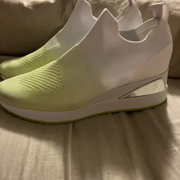 Women’s Alfani two tone sneakers.