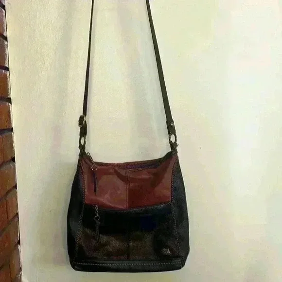The Sak, size medium, brown crossbody hand bag​