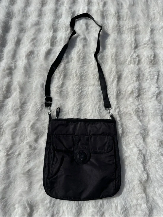 Kipling grilla girlz black crossbody purse multiple pockets adjustable strap