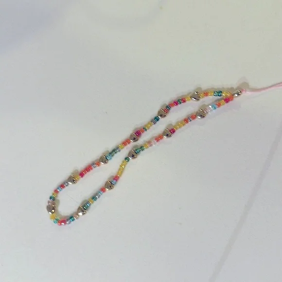 Beaded cell phone wrislet