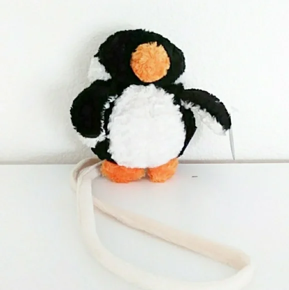 Stuffed penguin cell phone cover