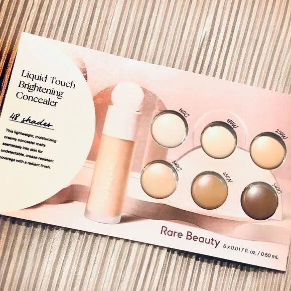 RARE BEAUTY Liquid Touch Brightening Concealer.
