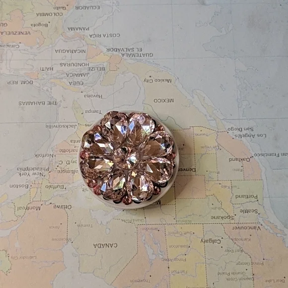 Pink bejeweled phone holder